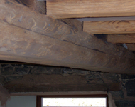 Cleaning wooden beams.
