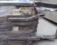 Underneath car body before sandblasting.