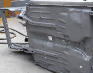 Underneath car body after sandblasting.