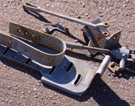 Vintage tractor parts to be sandblasted.