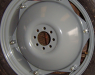Vintage tractor wheel after sandblasting and refinishing.